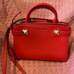 Michael Kors orange hand carry or ad detachable strap for Crossbody look